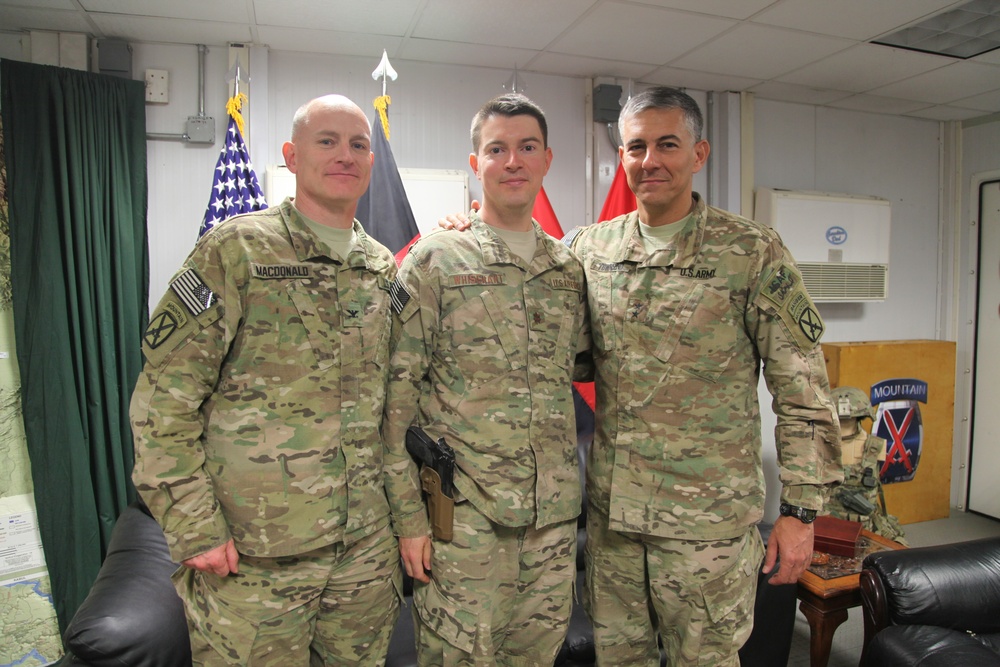 Maj. Robert Whisenant coined by Maj. Gen. Stephan Townsend on Bargram Airfield