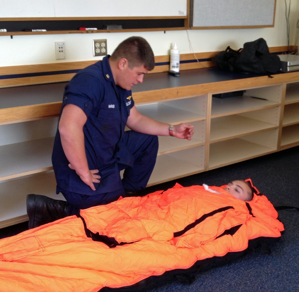 Coast Guard aviation survival technicians conduct emergency hypothermia training at Air Station Kodiak, Alaska