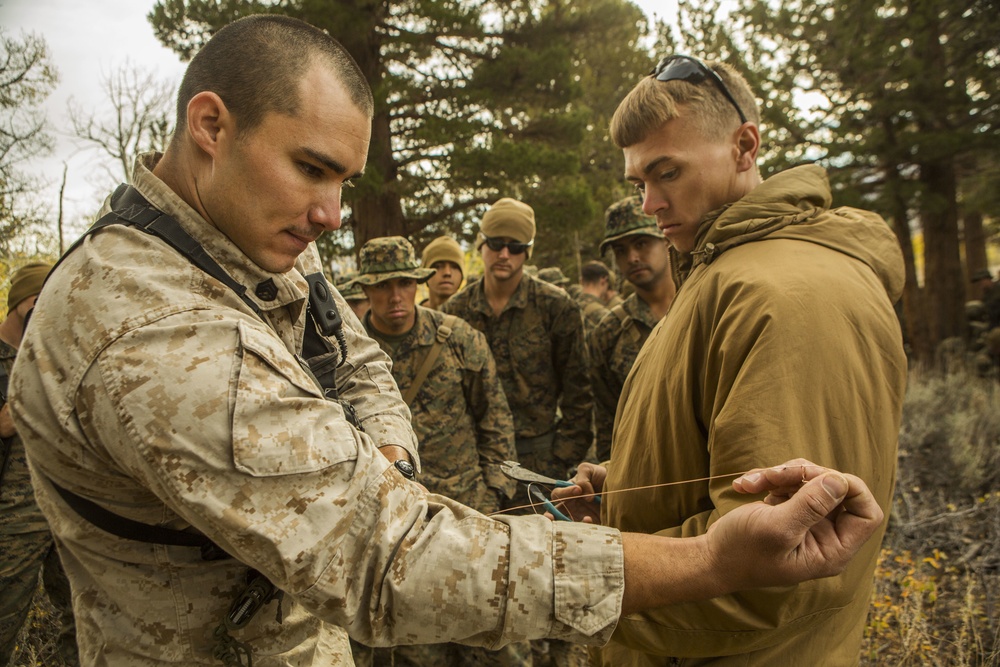 CLB-6 and 2/5 Marines receive classes on traps and snares at Mountain Warfare Training Center