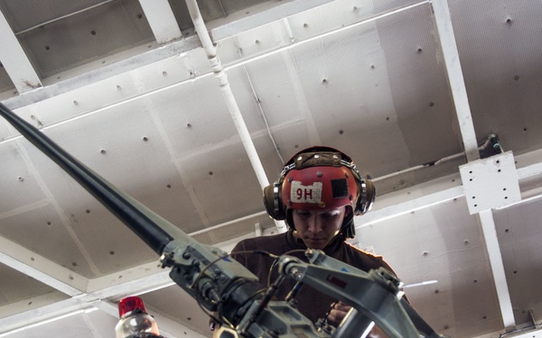 Sailor performs maintenance