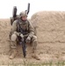 US Army EOD Soldier pulls grenade from man's leg