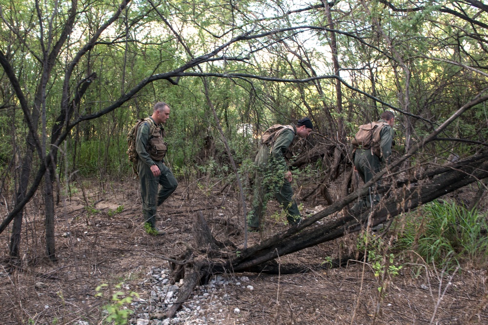 Aircrew members traverse SERE combat survival training challenges