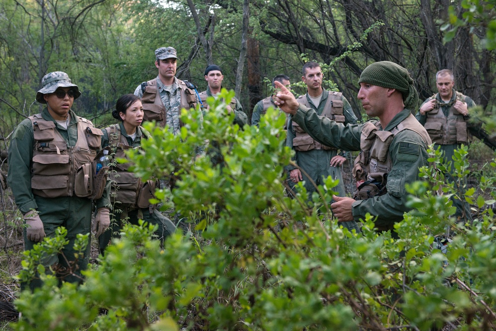 Aircrew members traverse SERE combat survival training challenges