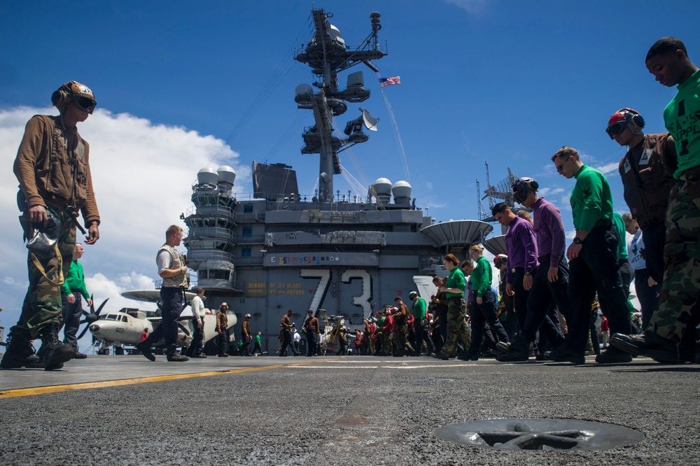 USS George Washington Sailors conduct a foreign object debris walkdown