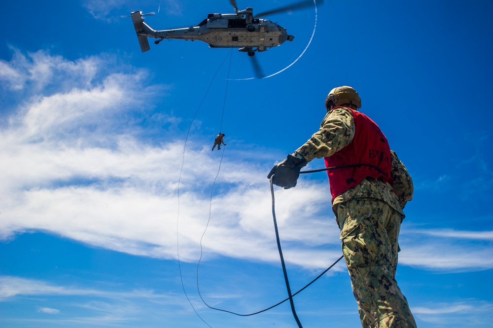 EOD Sailors rappel aboard USS George Washington