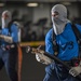 USS Harry S. Truman Sailors fight a simulated aircraft fire