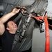 USS George H.W. Bush sailor performs maintenance