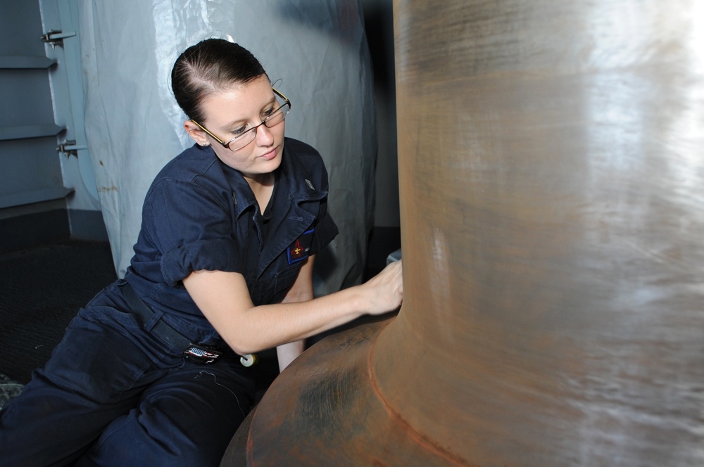 USS George H.W. Bush sailor at work