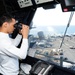 USS George H.W. Bush Sailor observes flight operations