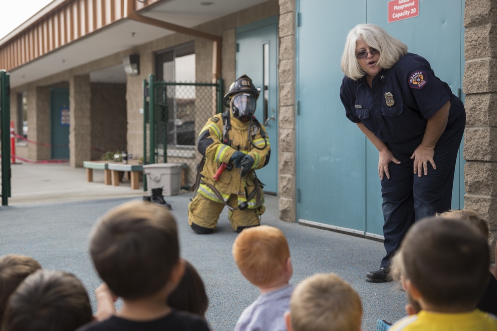 Firefighters teach kids about fire safety
