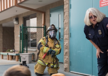 Firefighters teach kids about fire safety