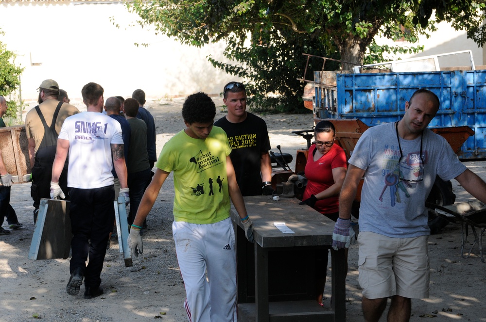 Seabees from NMCB 133 Detail Rota help Spanish monastery alongside with US, German and Turkish Sailors