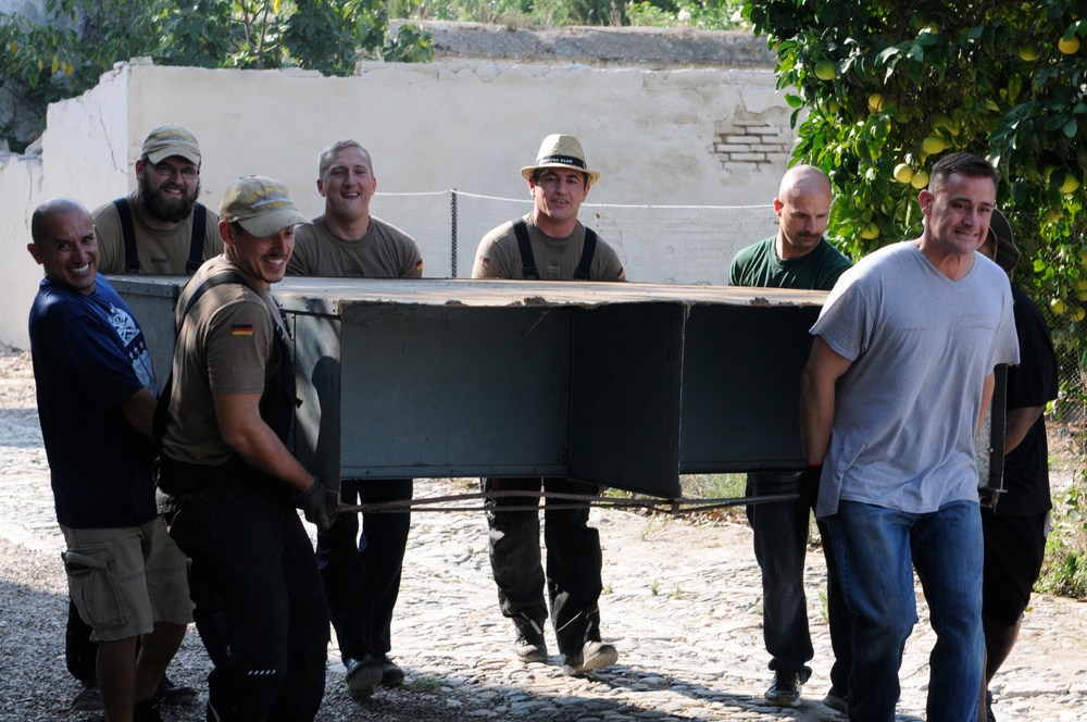 Seabees from NMCB 133 Detail Rota help Spanish monastery alongside with US, German and Turkish Sailors