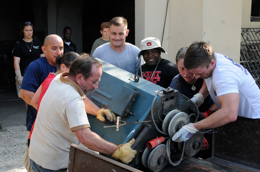 Seabees from NMCB 133 Detail Rota help Spanish monastery alongside with US, German and Turkish Sailors