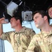 British service members tour USS Makin Island