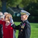 General Amos and His Wife Bonnie wave to some of their Friends and Family attending the 35th Commandant of the Marine Corps Change of Command Ceremony