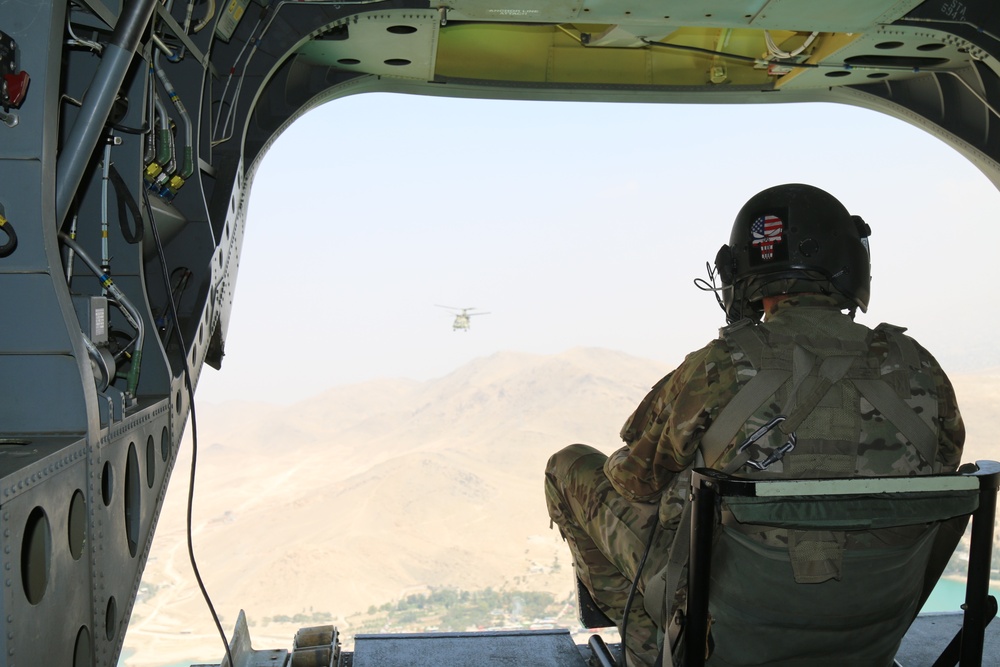 Rear-door gunner pulls security on a CH-47 Chinook