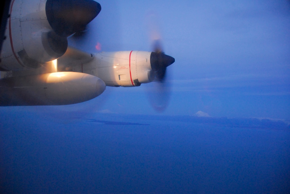 Coast Guard HC-130 Hercules aircrew conducts first light search and rescue operations over Cook Inlet, Alaska