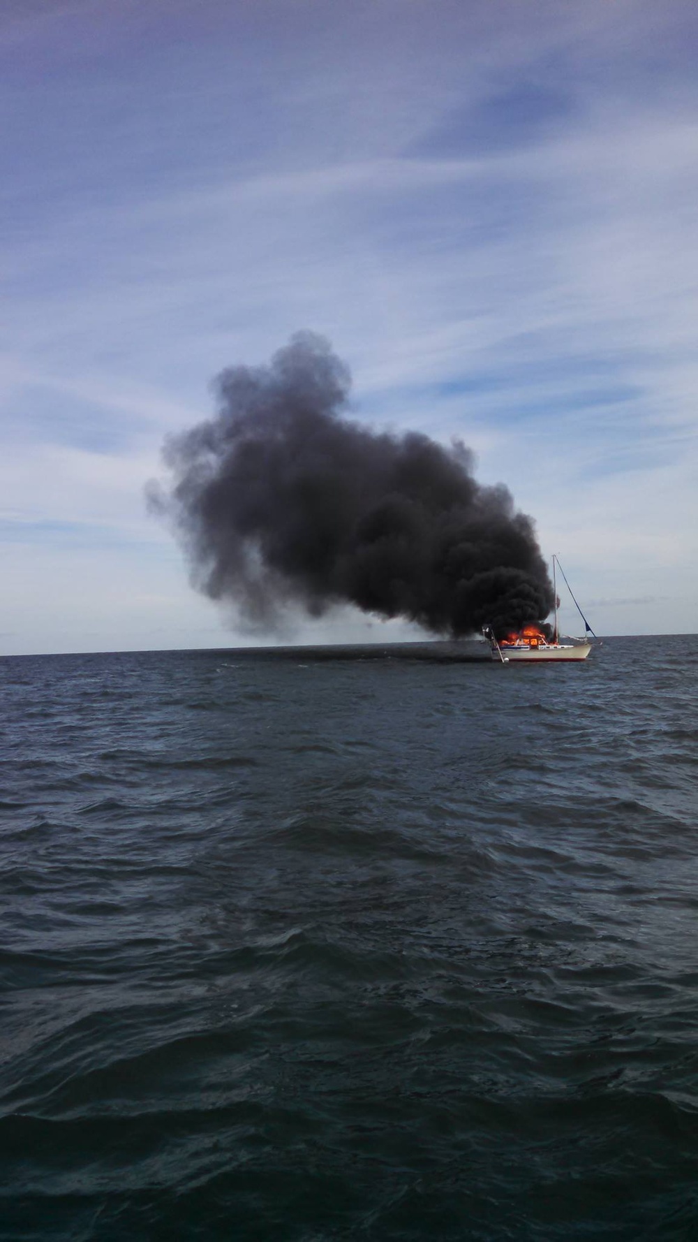 Coast Guard, good Samaritan rescue boater from boat fire
