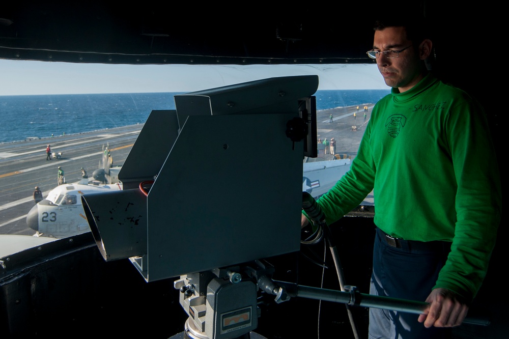 USS Carl Vinson Sailor monitors flight operations