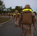 Headquarters and Service Company Marines reach foundations of combat conditioning through hiking