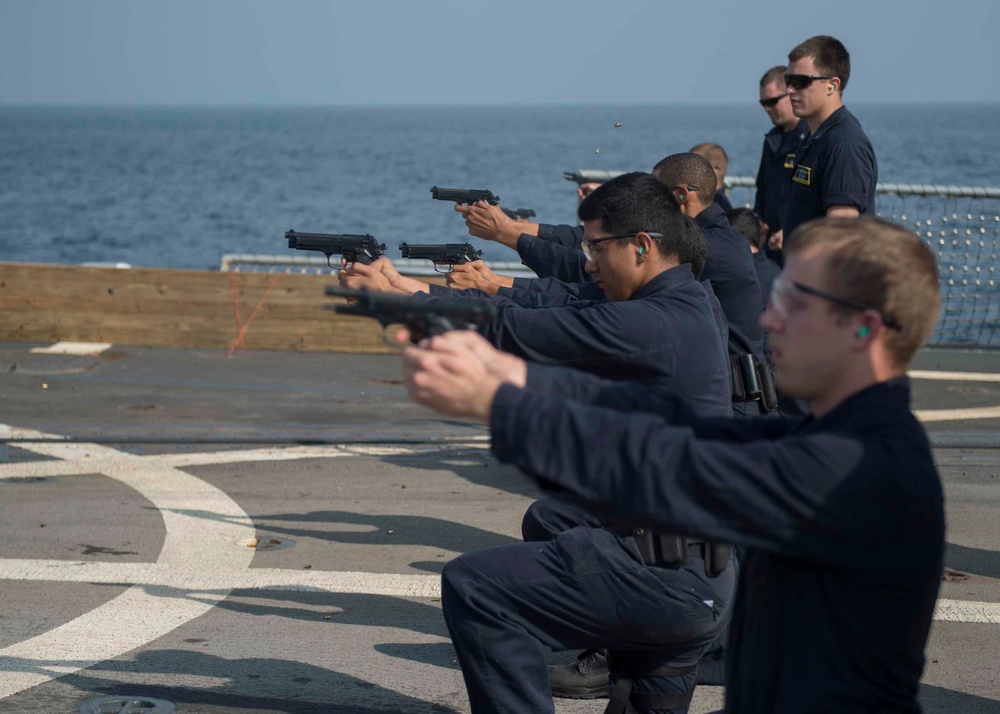 USS Dewey Sailors conduct small arms qualification
