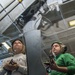 USS Carl Vinson Sailors inspect Seahawk