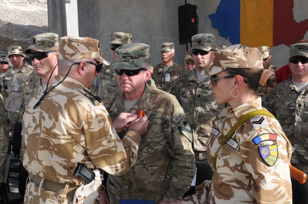 Romanian NSE celebrates Armed Service Day and end of mission at KAF
