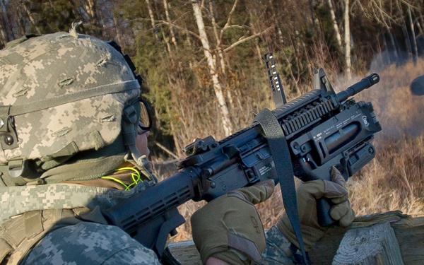 Paratroopers fire grenade launchers