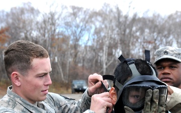 US Army Soldiers display chemical protective equipment during Orient Shield 14
