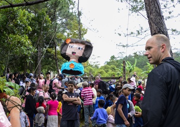 With the strength of their backs, Joint Task Force-Bravo delivers goods to Hondurans in need