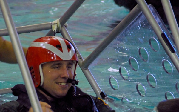 Coast Guard air crew members undergo annual wet drills testing at Air Station Kodiak, Alaska
