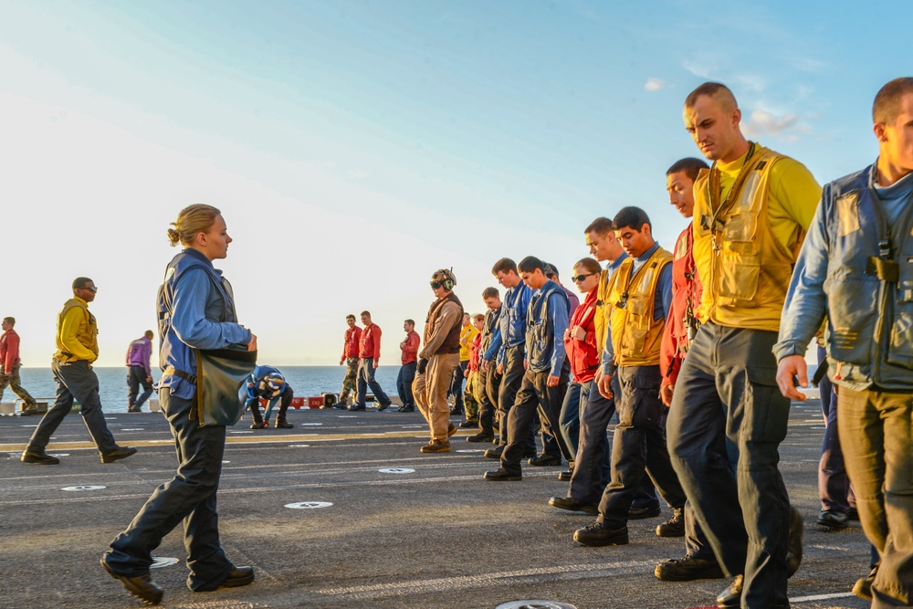 USS Iwo Jima Sailors conduct foreign object debris walk-down