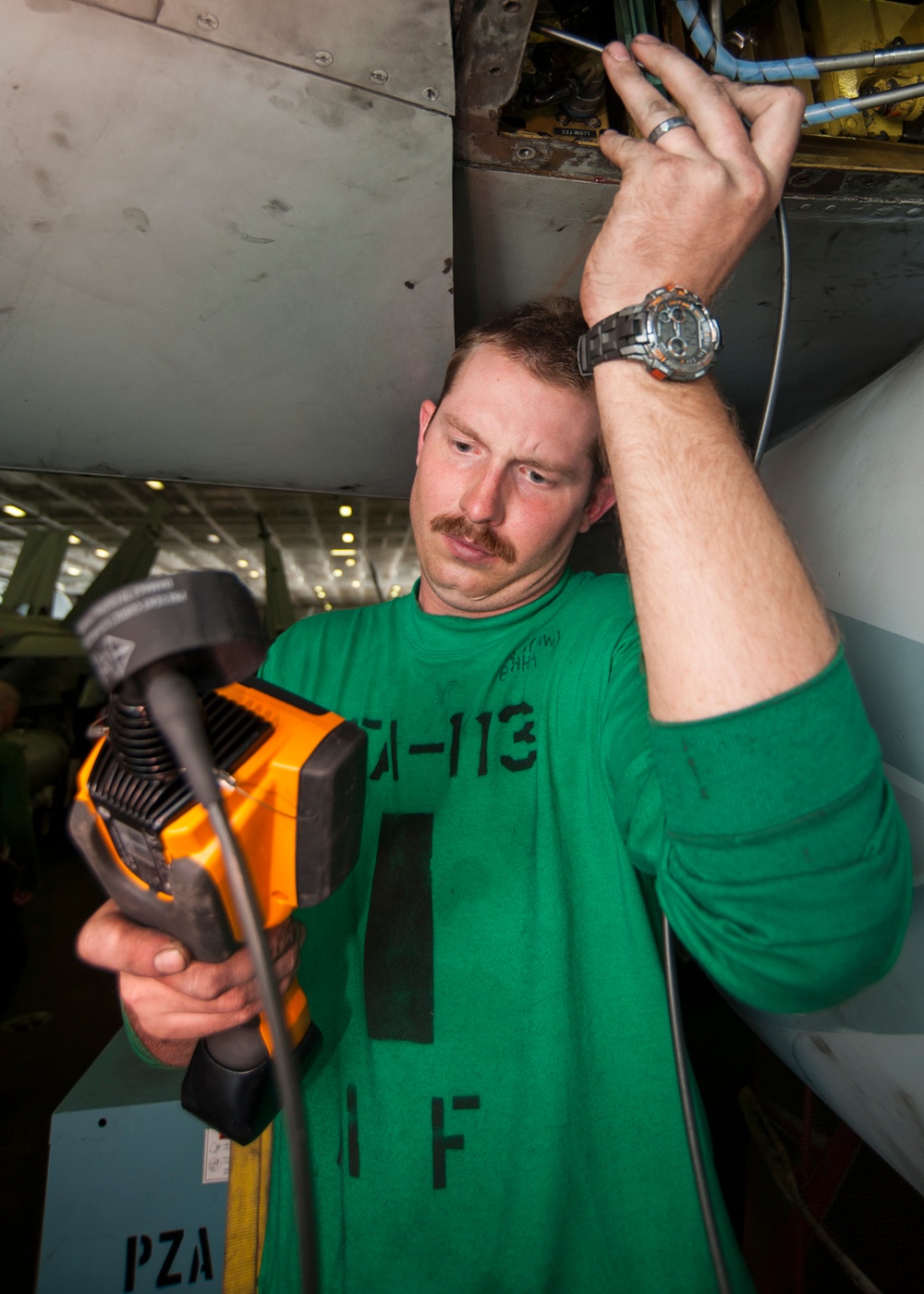 Sailors conduct F/A-18C Hornet maintenance