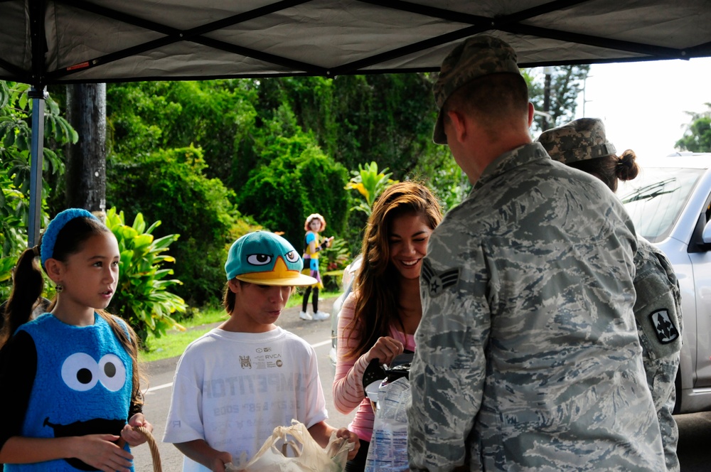 Hawaii National Guardsmen pass out candy to trick or treaters, patrol neighborhoods as lava flow continues