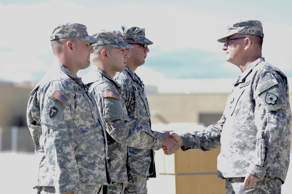 Nevada National Guard Soldiers receive awards for pulling car-crash victim from burning vehicle, assisting at the scene of the accident