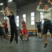 Eagle River High School hockey players work out with 1-Geronimo paratroopers