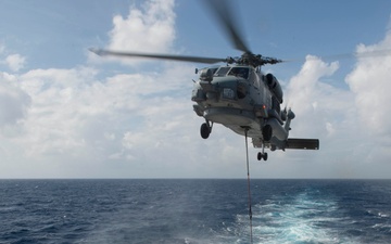 USS Rodney M. Davis conducts replenishment at sea with USNS Pecos