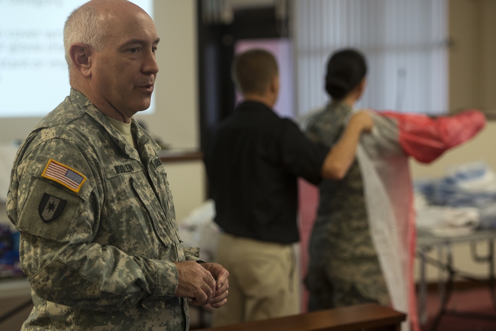 Service members, civilians train to defend against infectious diseases