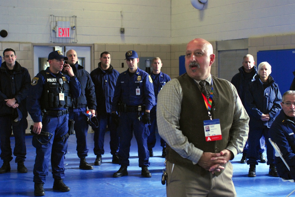 Coast Guard security debriefs on operations for the 2014 TCS New York Marathon
