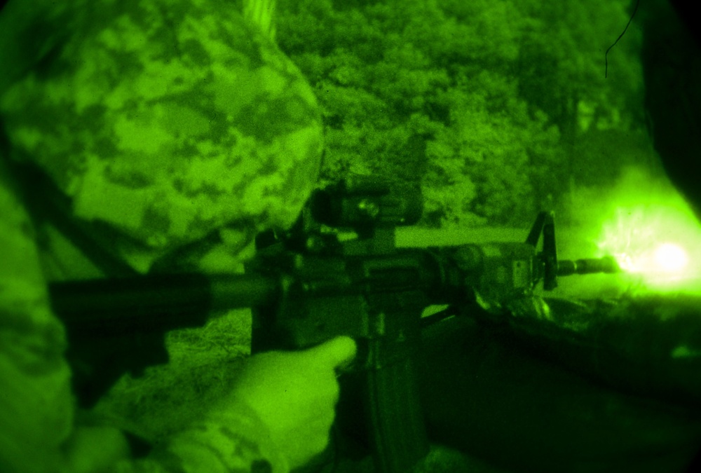 633rd SFS Airmen conduct night firing