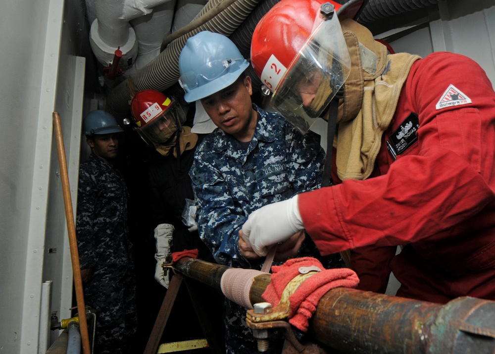 USS Blue Ridge Sailors conduct flooding drill