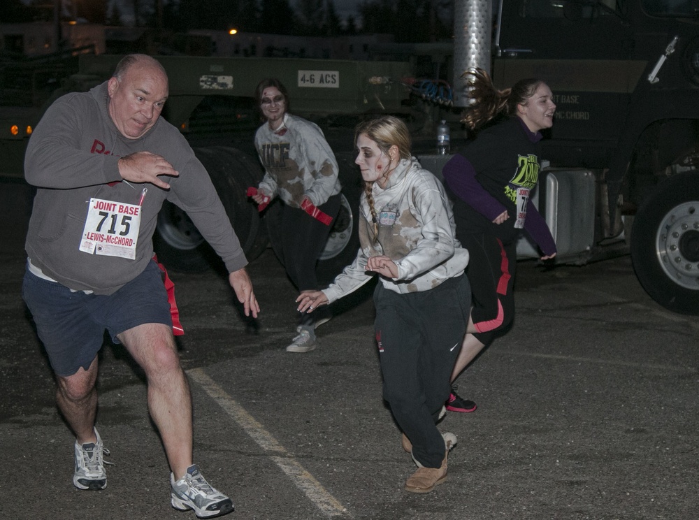 Inaugural Zombie Run brings fun, fright, family to JBLM