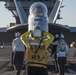 Nimitz Sailor directs Hornet onto catapult