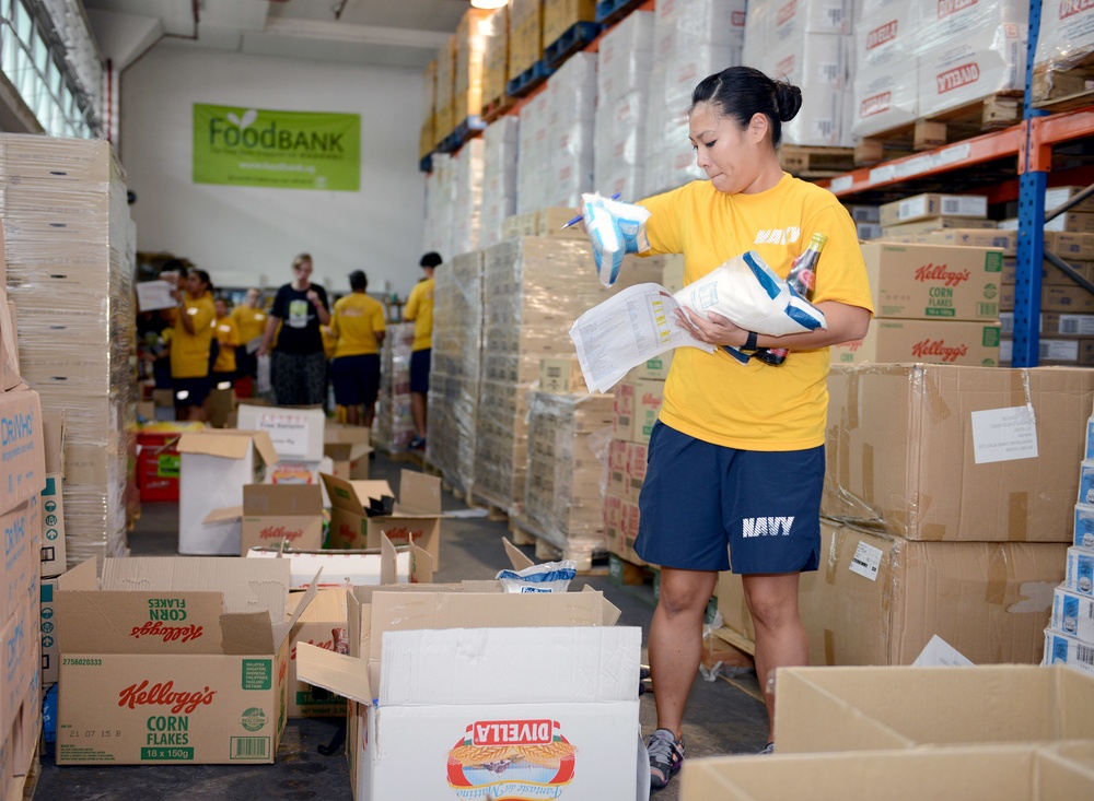 Sailors conduct community service project at The Food Bank Singapore