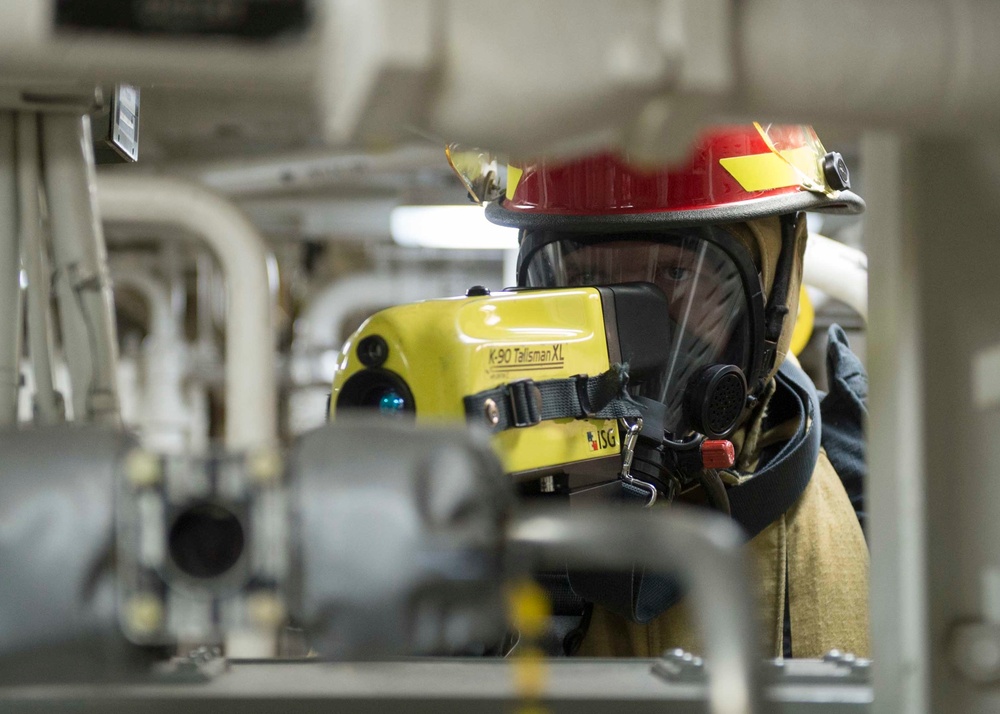 USS Dewey Sailors drill