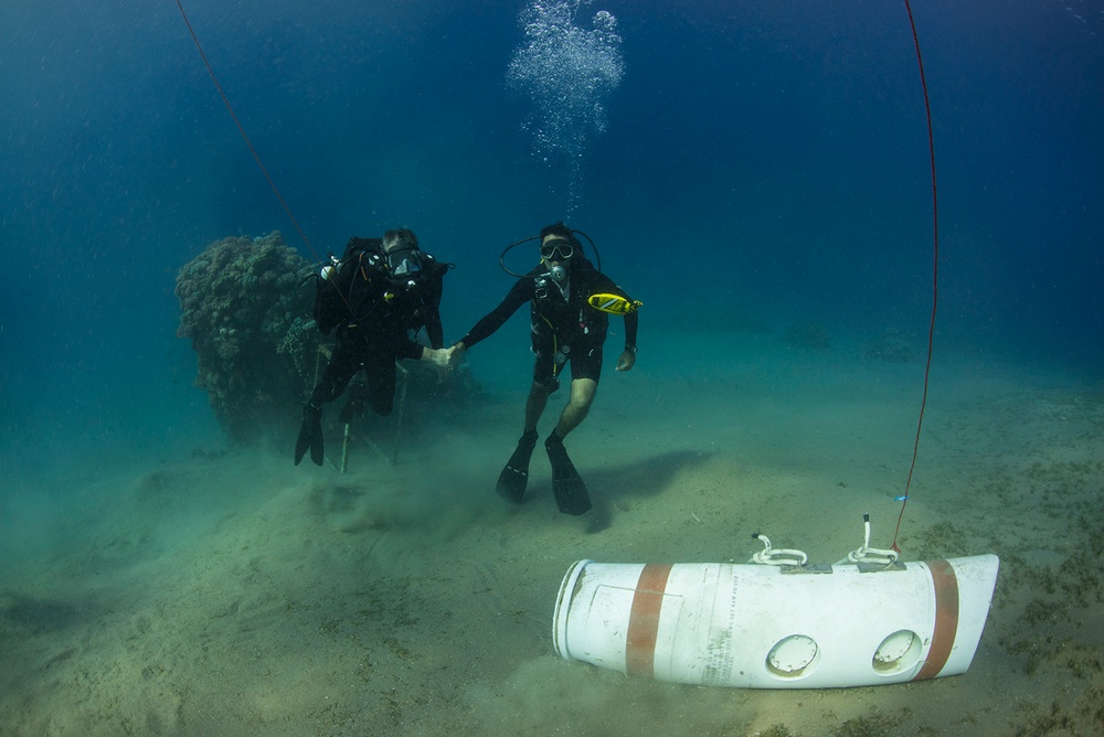 Explosive ordnance disposal divers