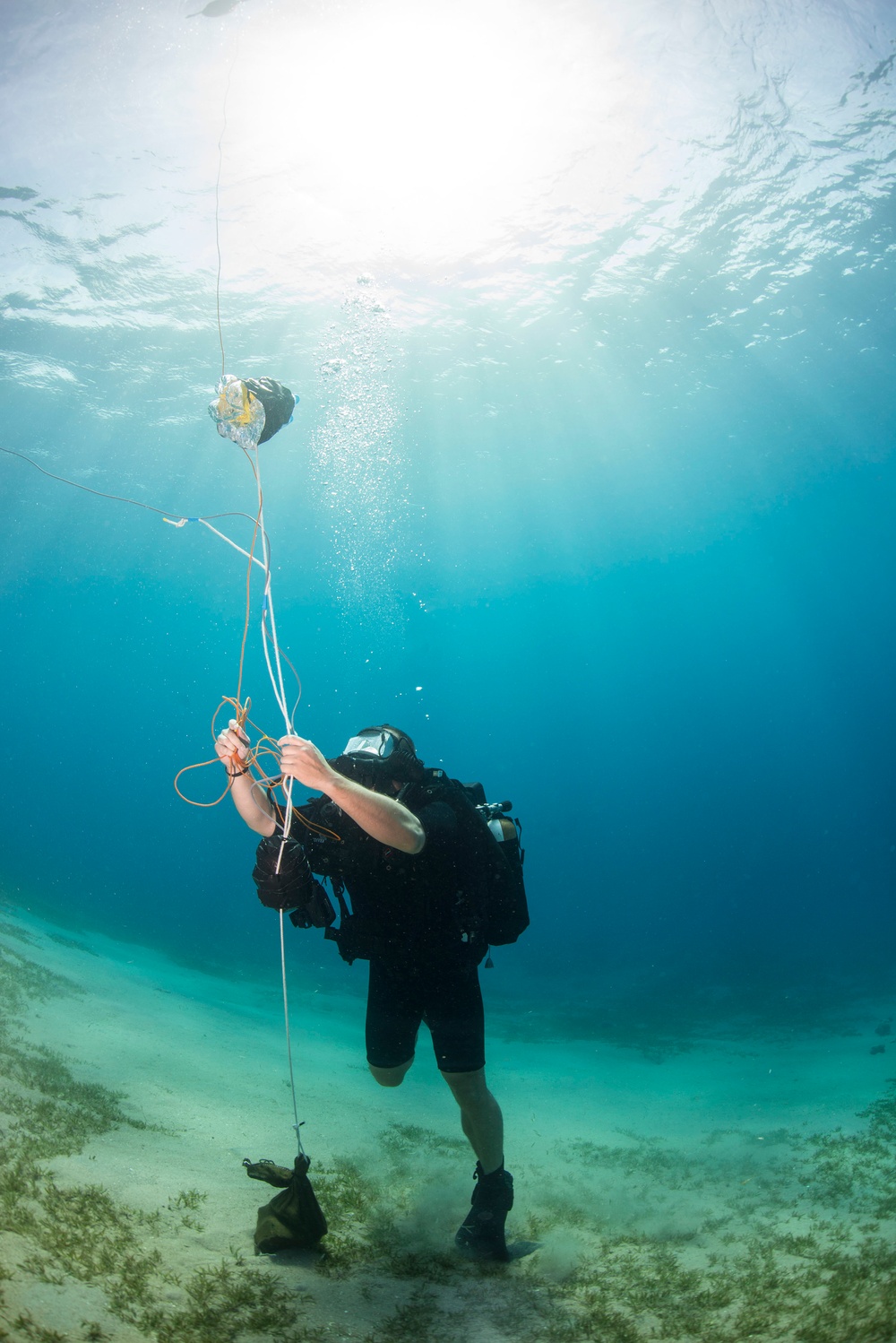 Explosive ordnance disposal divers