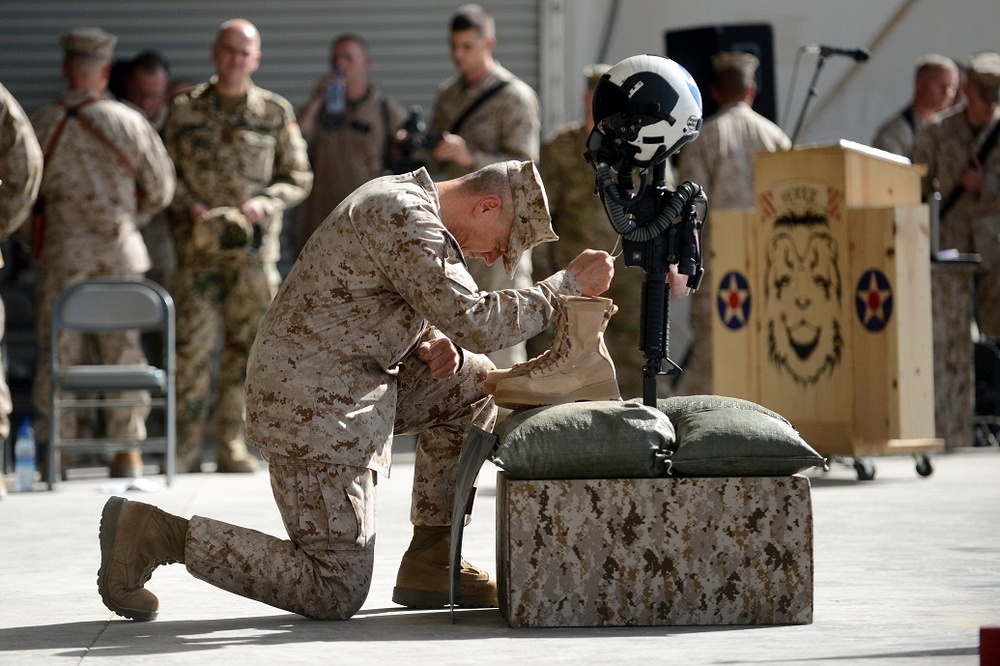 Gen. Allen kneeling