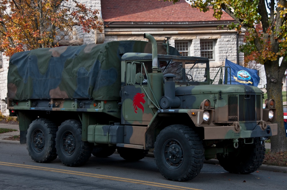 179th Airlift Wing and 200th RED HORSE members march in Veterans Day Parade